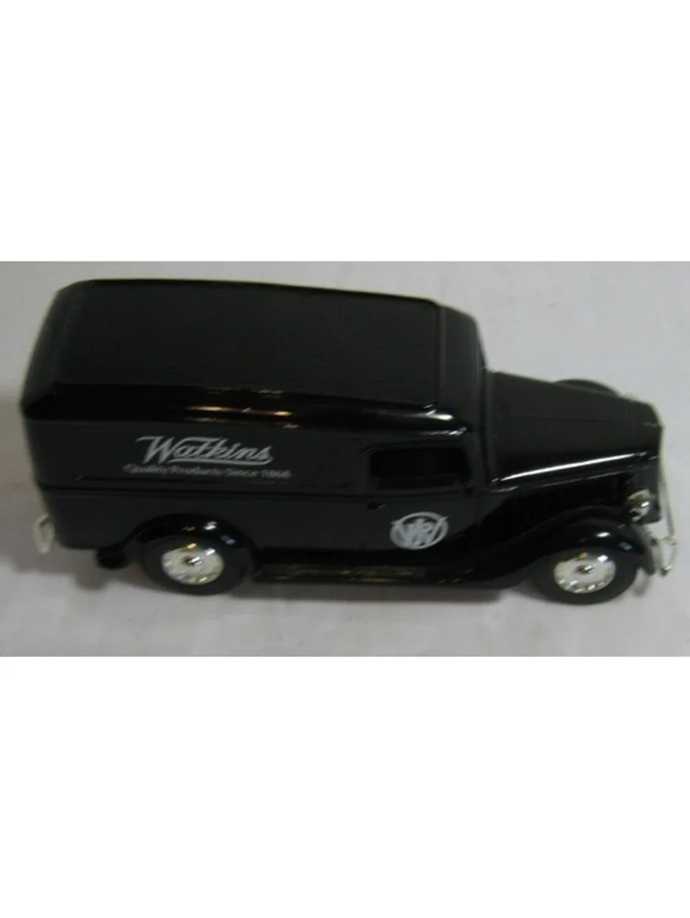 ERTL COLLECTIBLES 1998 WATKINS COLLECTIBLES 1936 FORD PANEL TRUCK BANK WITH KEY